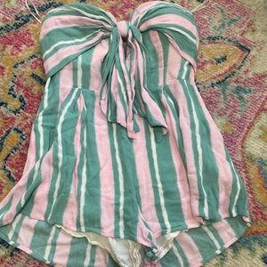Green and pink romper never worn